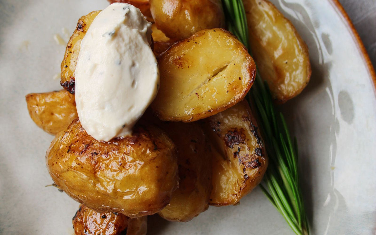 Roasted potatoes topped with a cottage cheese and chive topping