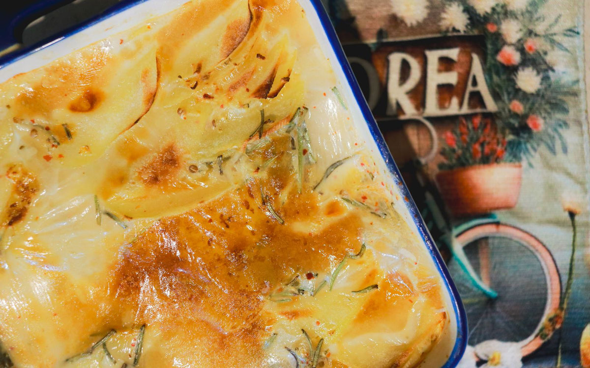 Scalloped potatoes baked in a creamy sauce