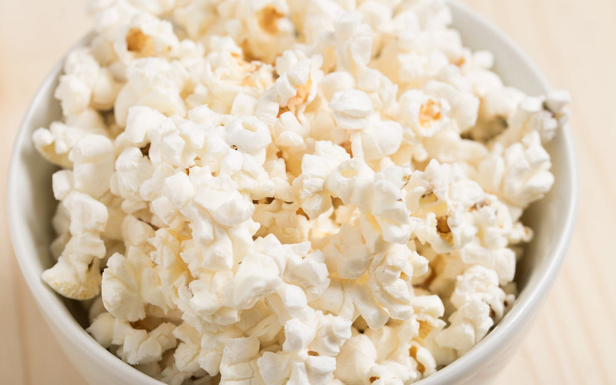 A bowl of freshly popped popcorn