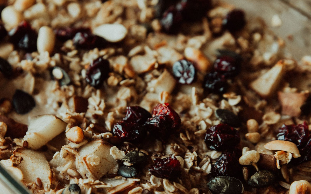 Baked oats with dried cranberries and nuts, close up