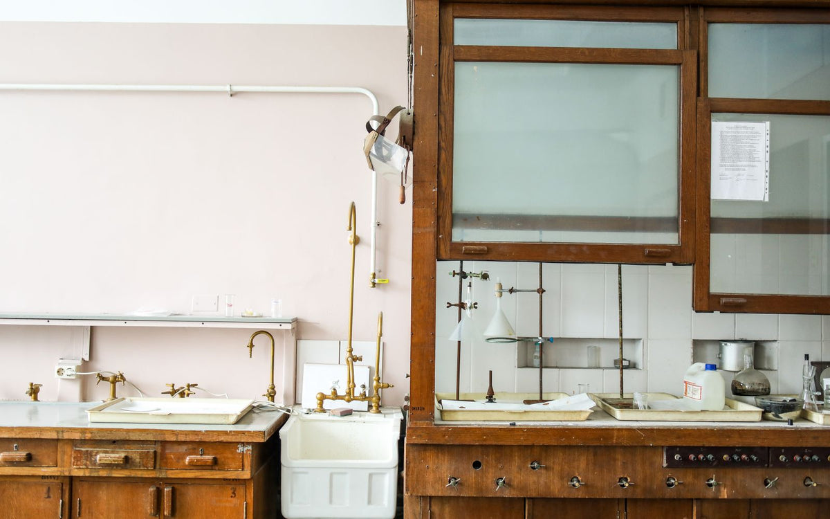 A vintage laboratory interior showcasing classic chemistry equipment and workstations