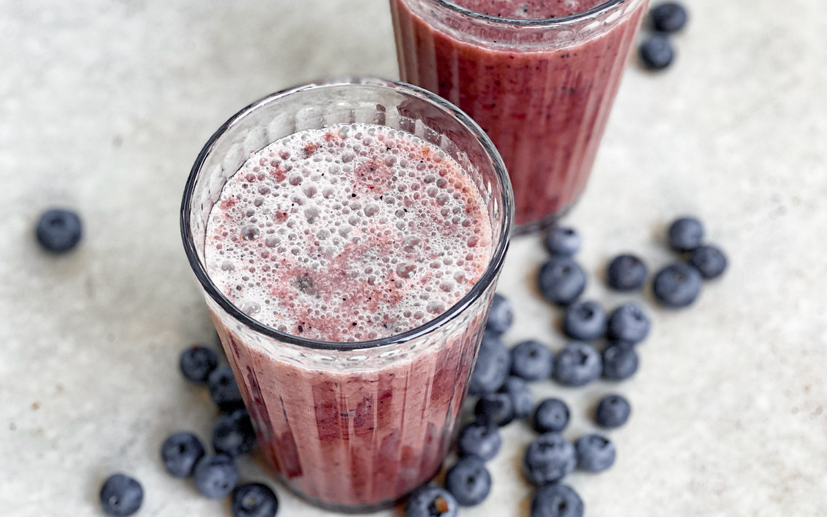 Berry smoothie in a glass with kefir